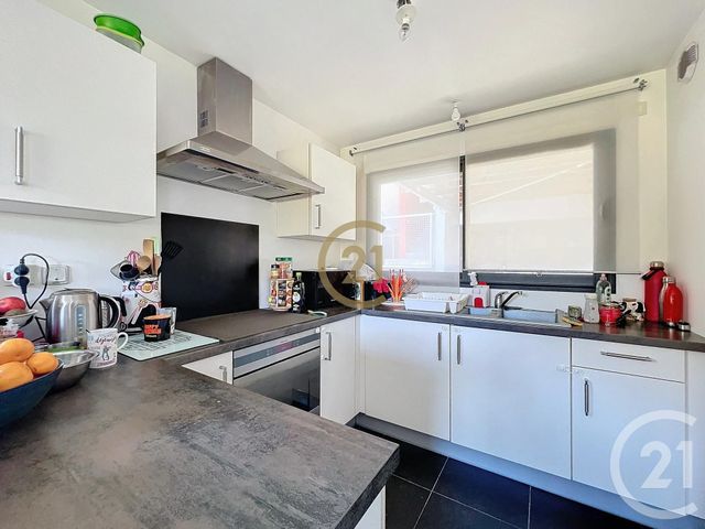 Afficher la photo en grand Appartement Souplex à vendre - 4 pièces - 80.84 m2 - MONTBELIARD - 25 - FRANCHE-COMTE - Century 21 Agence De La Gare