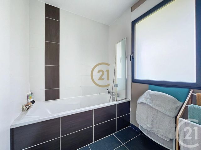 Afficher la photo en grand Appartement Souplex à vendre - 4 pièces - 80.84 m2 - MONTBELIARD - 25 - FRANCHE-COMTE - Century 21 Agence De La Gare