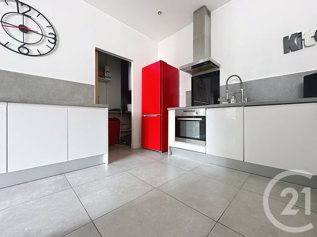 Afficher la photo en grand Appartement F4 à louer - 4 pièces - 100.0 m2 - MONTBELIARD - 25 - FRANCHE-COMTE - Century 21 Agence De La Gare