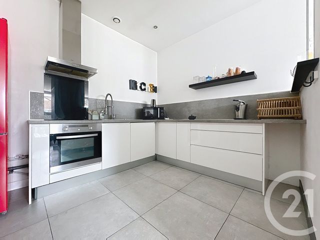 Afficher la photo en grand Appartement F4 à louer - 4 pièces - 100.0 m2 - MONTBELIARD - 25 - FRANCHE-COMTE - Century 21 Agence De La Gare